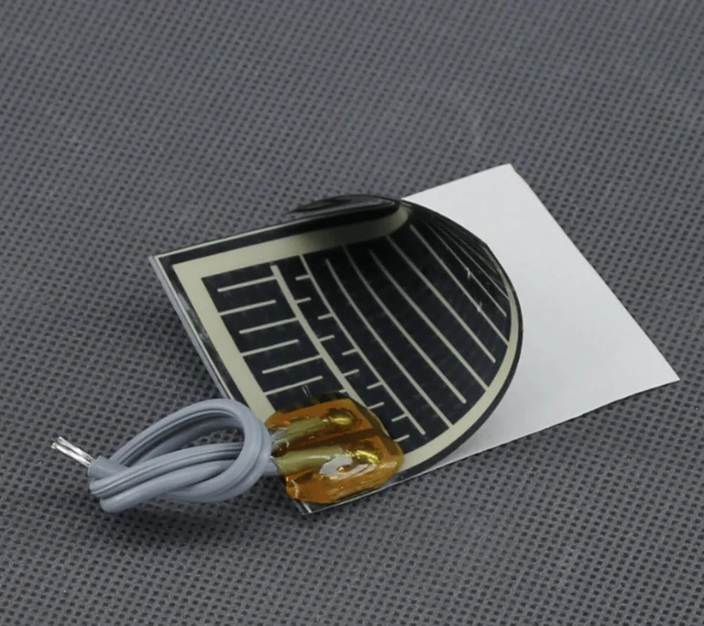 TF1224 - 12V/ 3W topná folie ohebná, samolepicí, PES (60 x 47mm)