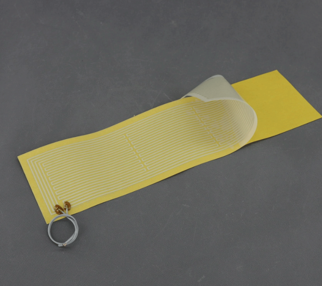 TF1246 - 24V/ 30W topná folie ohebná, samolepicí, PES (520x 146mm)