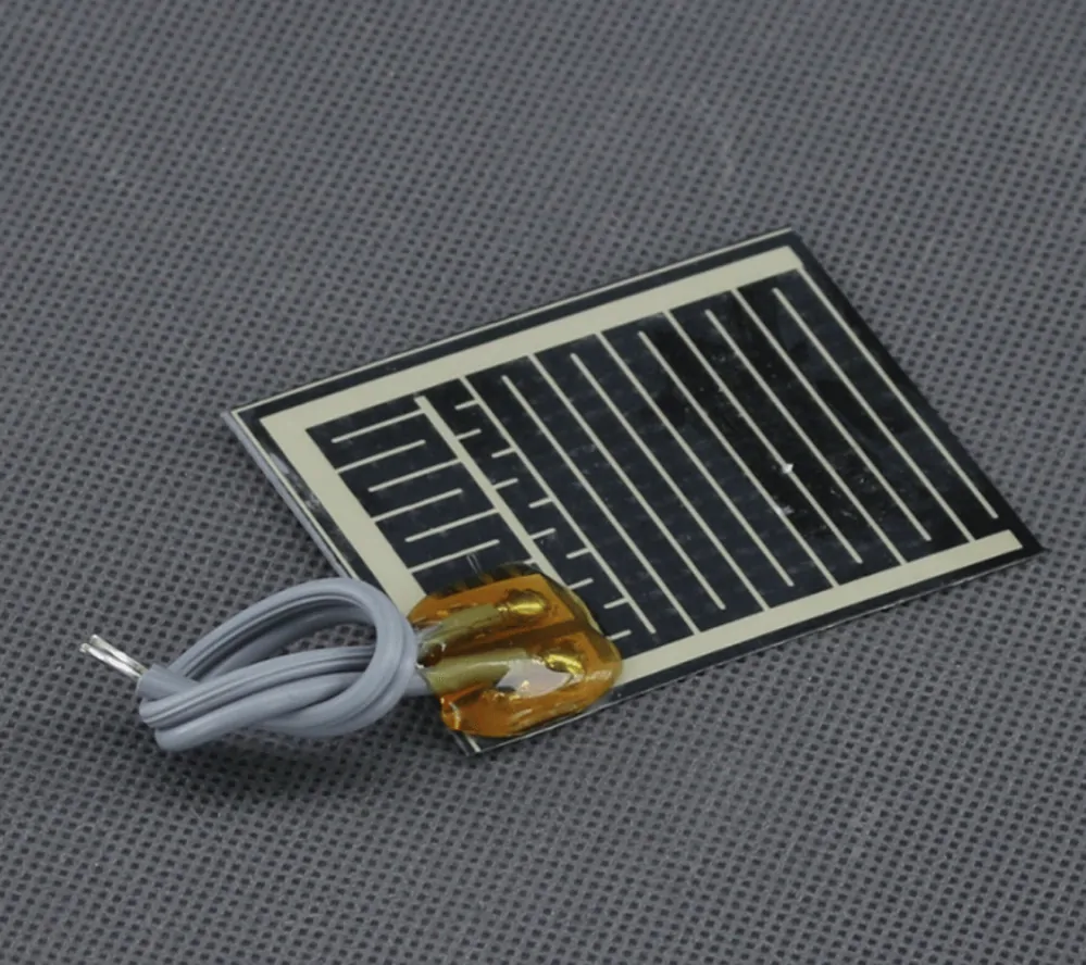TF1224 - 12V/ 3W topná folie ohebná, samolepicí, PES (60 x 47mm)