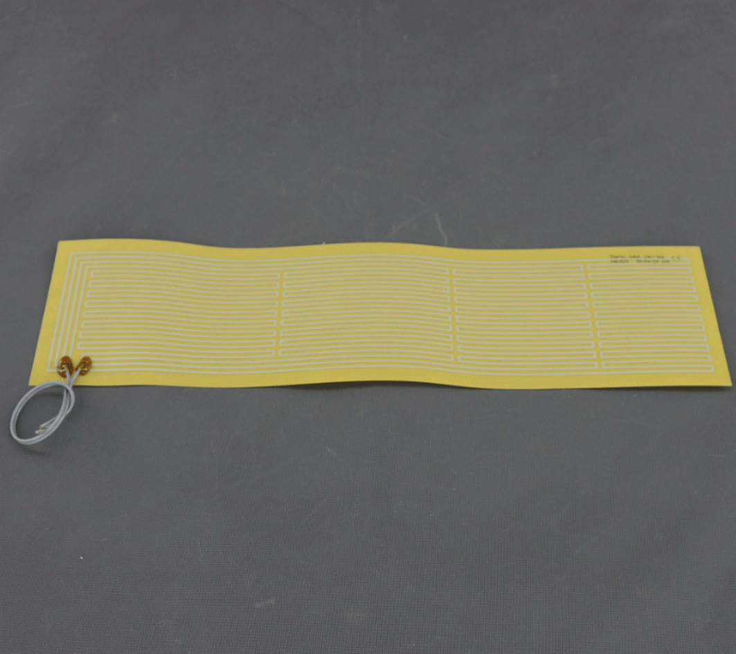 TF1245 - 12V/ 8W topná folie ohebná, samolepicí, PES (520x 146mm)